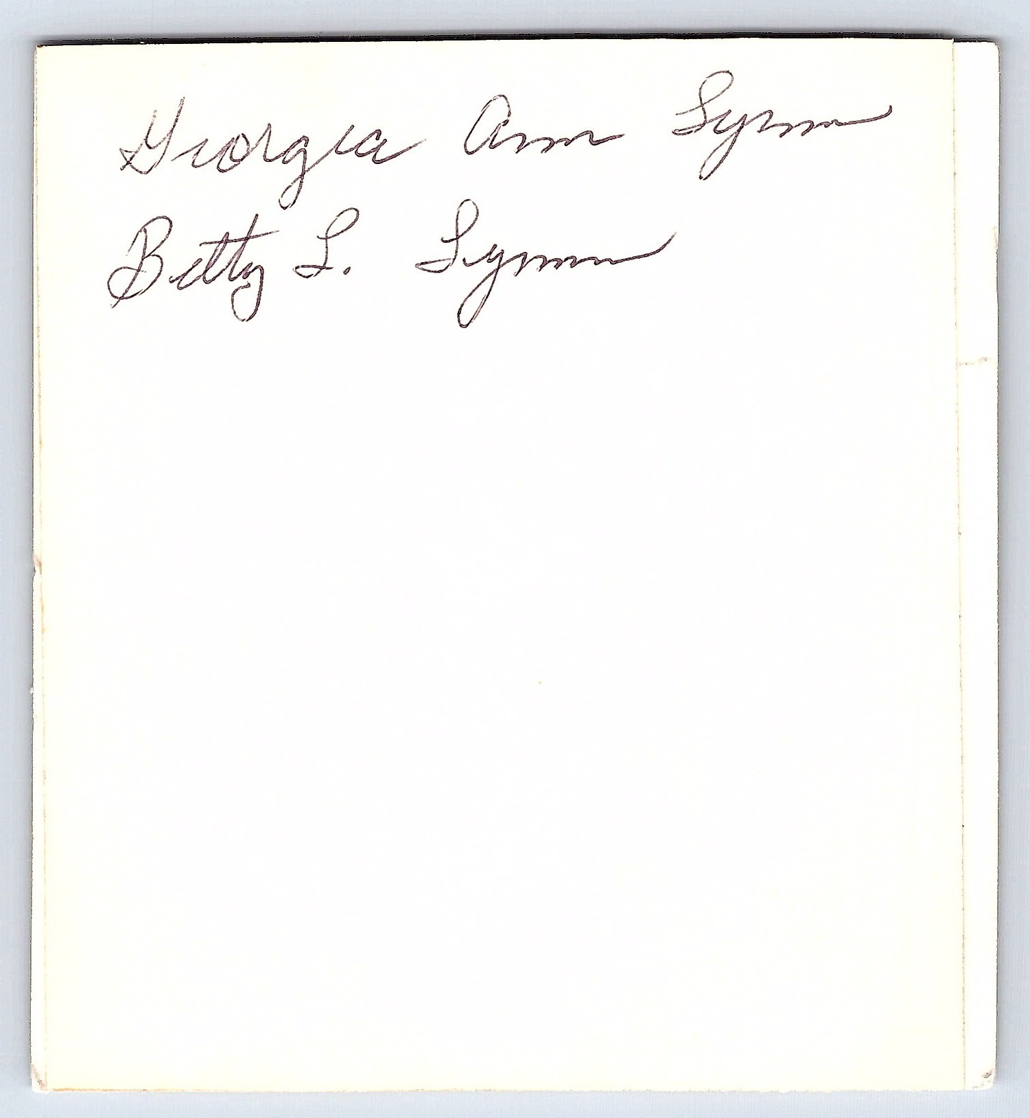 1960s Snapshot of Two Women in Matching Outfits, Backyard Setting - Back